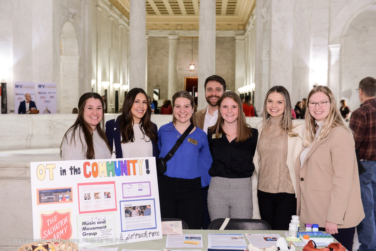 President Jacob Greenfield and OT students promoting OT's Role in the Community